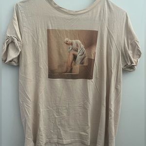 medium tan Ariana Grande shirt